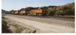 BNSF 7439 pulls the grade on Cajon Pass as she rolls east towards Barstow, Ca.